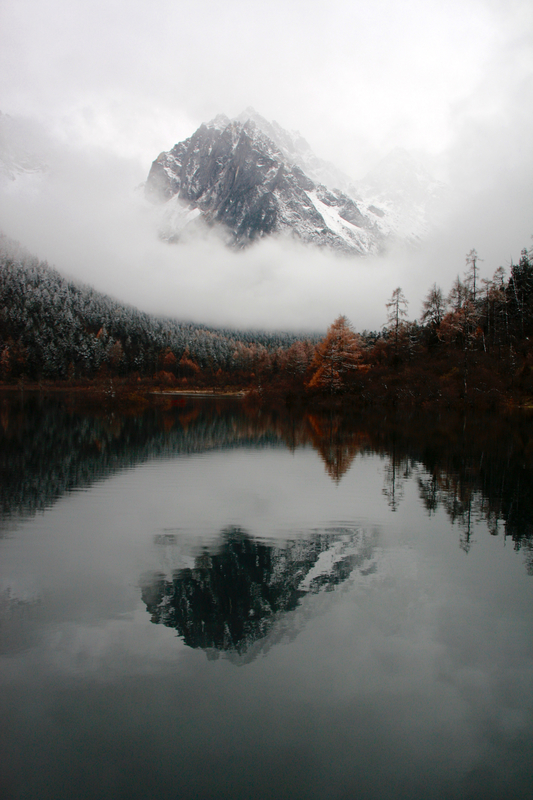 reflection of mountain in lake