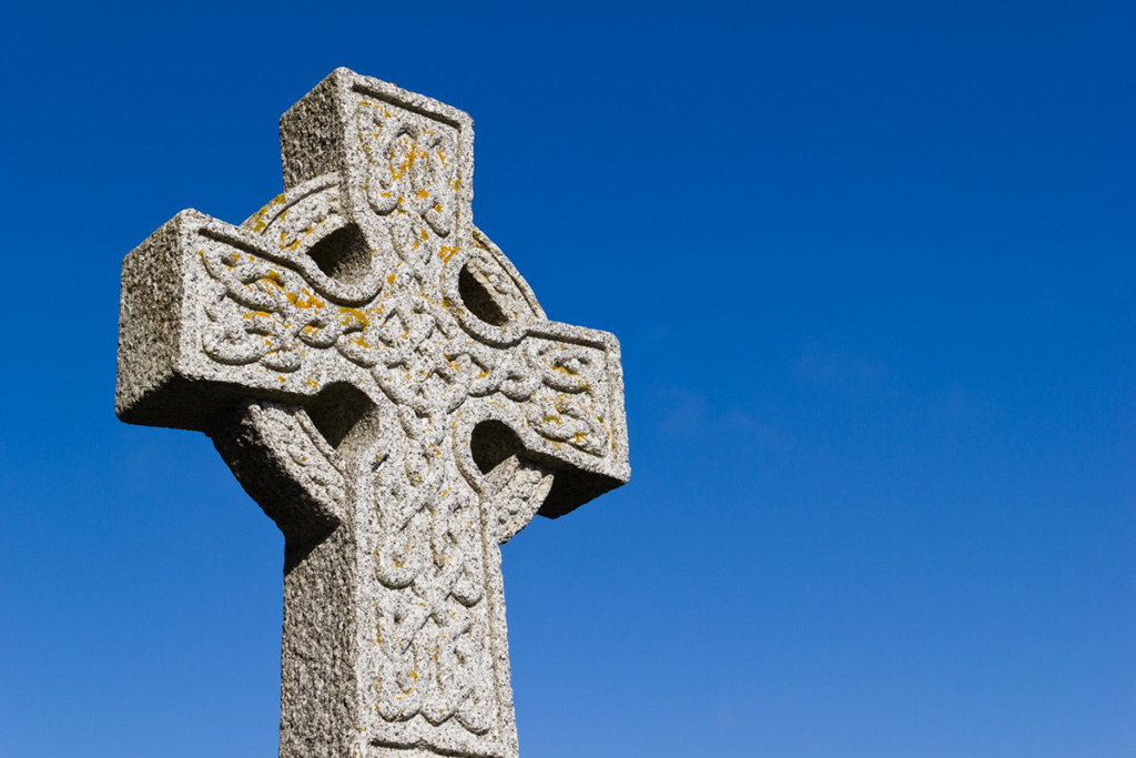 high cross against blue sky