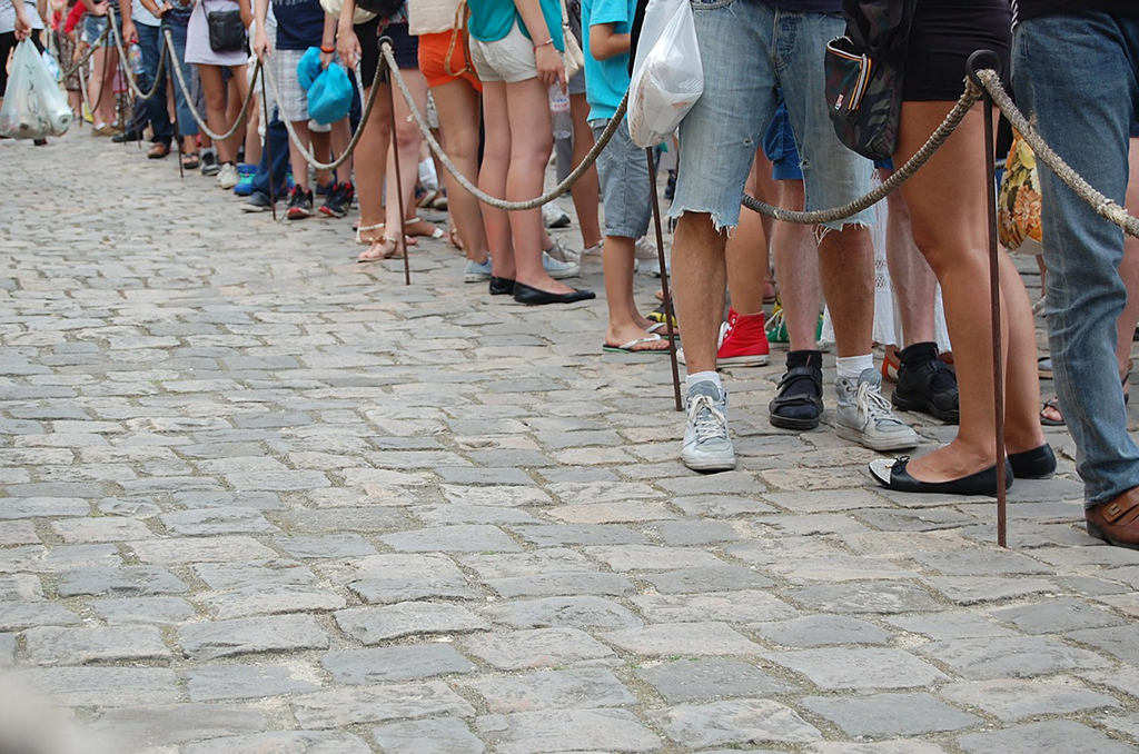 people waiting in line outside