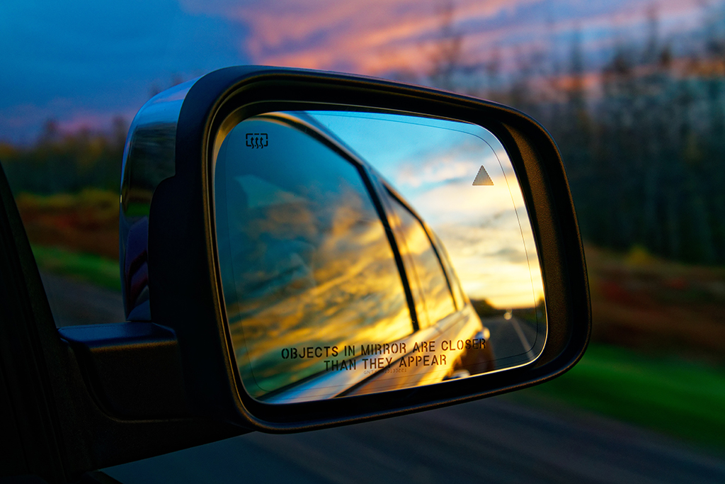 sunset in a car mirror