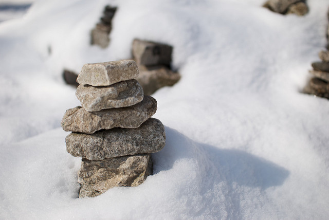 stacked stones in snow